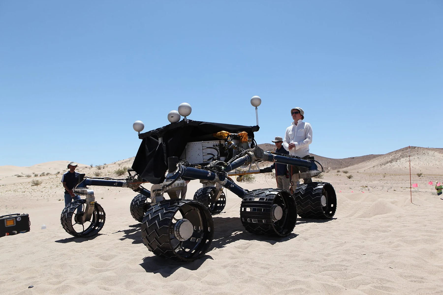 NASA/JPL-Caltech Scarecrow six-wheel rover during a desert mobility test.