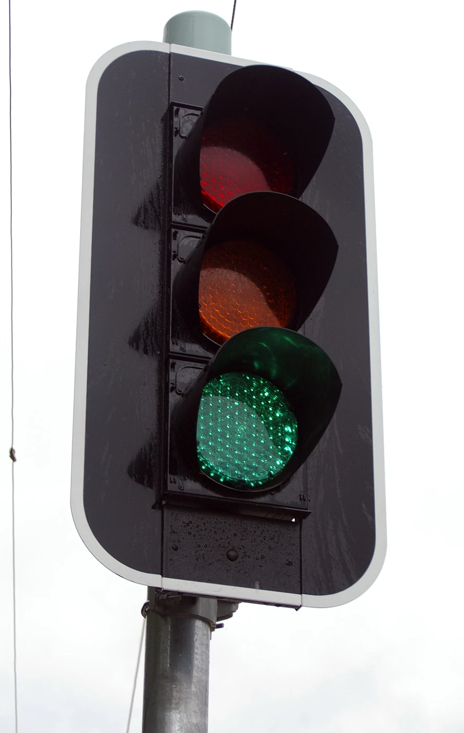 A real three-aspect LED traffic signal in Forest Hill, New South Wales.