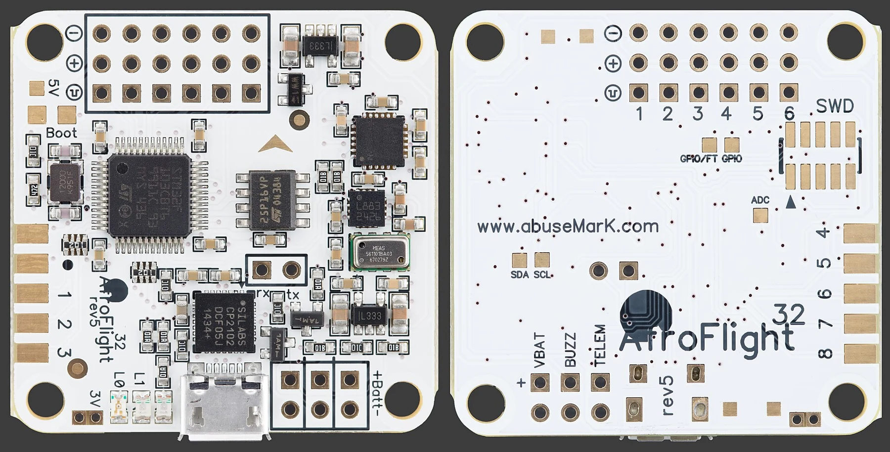 A photographic macro view of the front and back of a Naze32 multicopter flight-controller board.